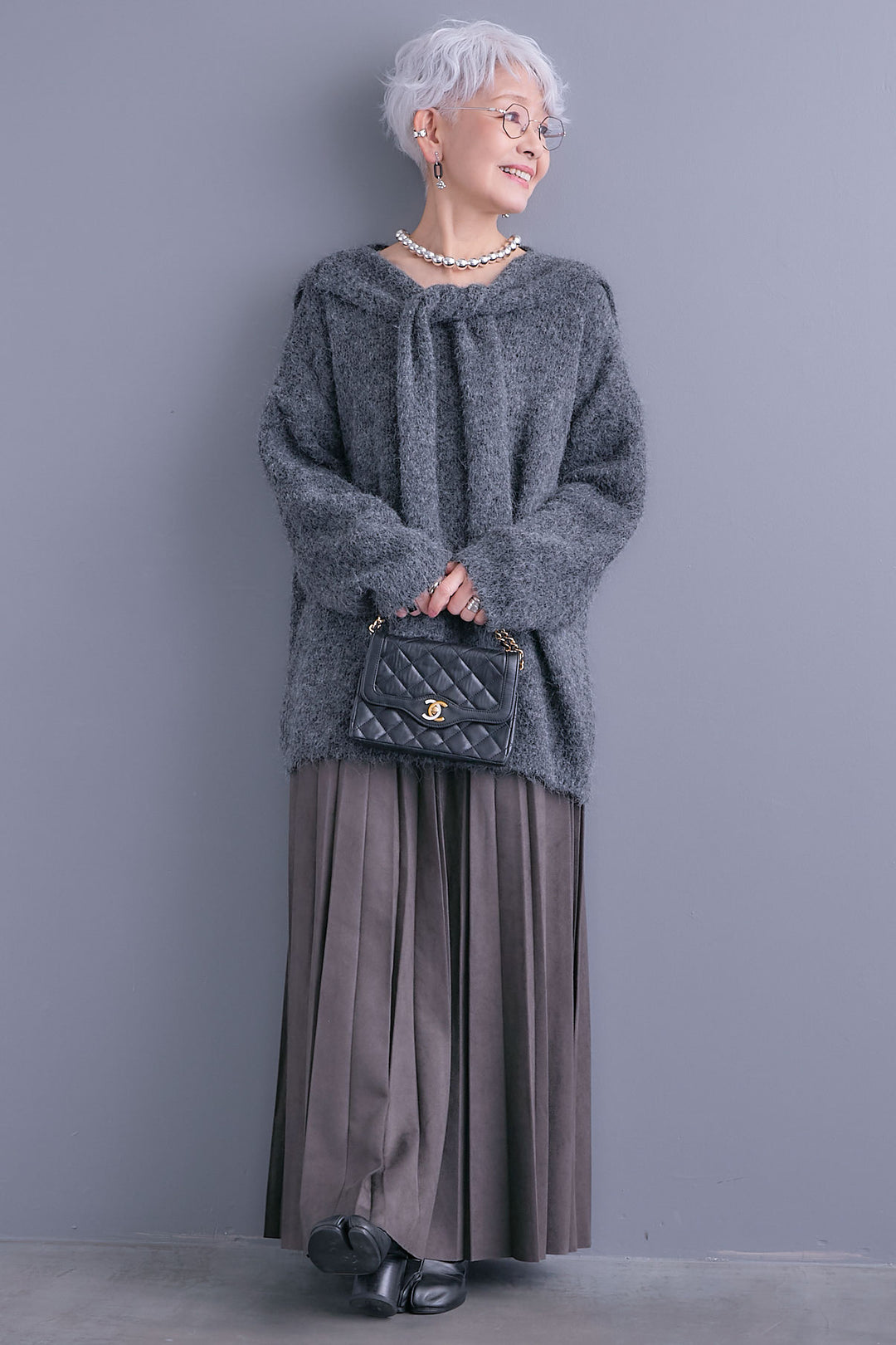 【SET】カーデケープVネックニット+スエードロングプリーツスカート(2set)