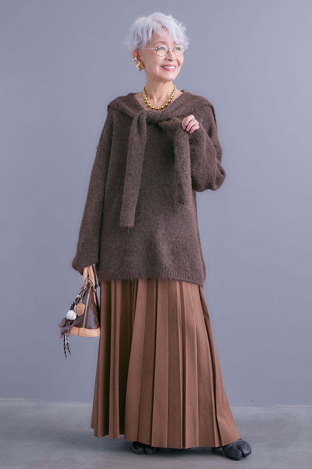 【SET】カーデケープVネックニット+スエードロングプリーツスカート(2set)