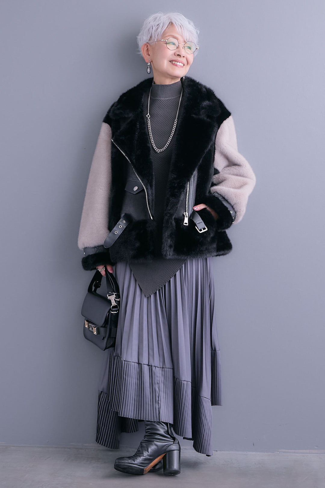 【SET】アシンメトリーオーバーニット+ライダースドッキングエコファージャケット+アシンメトリープリーツスカート(3set)