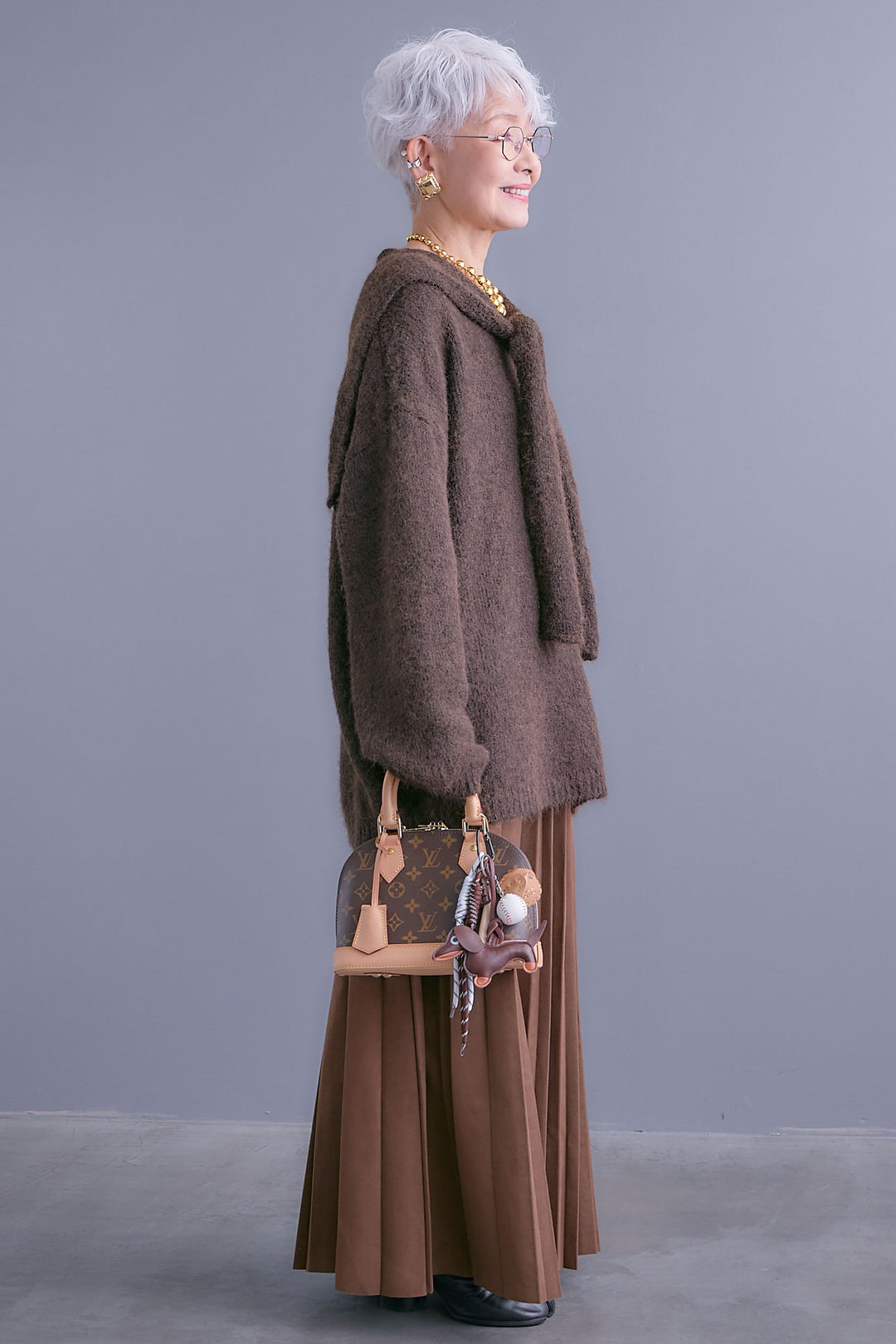 【SET】カーデケープVネックニット+スエードロングプリーツスカート(2set)