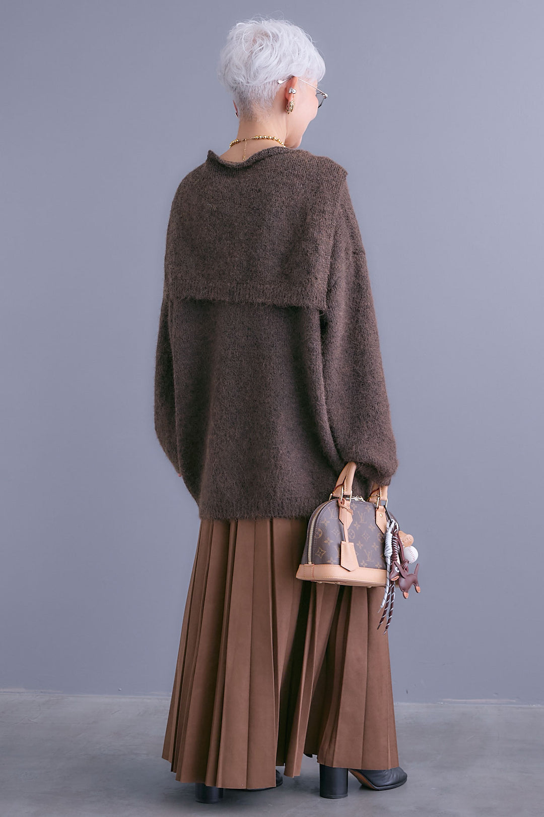 【SET】カーデケープVネックニット+スエードロングプリーツスカート(2set)