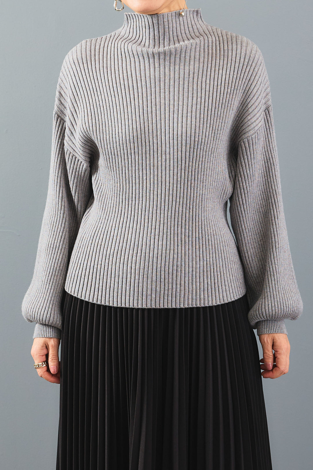 【SET】ボリュームスリーブハイネックリラクシーニット+ノーカラーラウンドシルエットファーコート+アシンメトリープリーツスカート(3set)