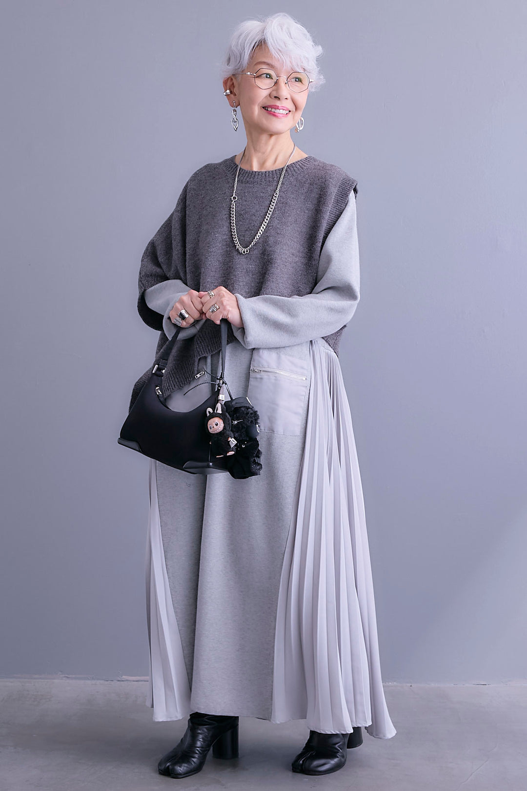 【SET】ケープライクアシンメトリーニットベスト+ZIPポケットサイドプリーツニットワンピース(2set)