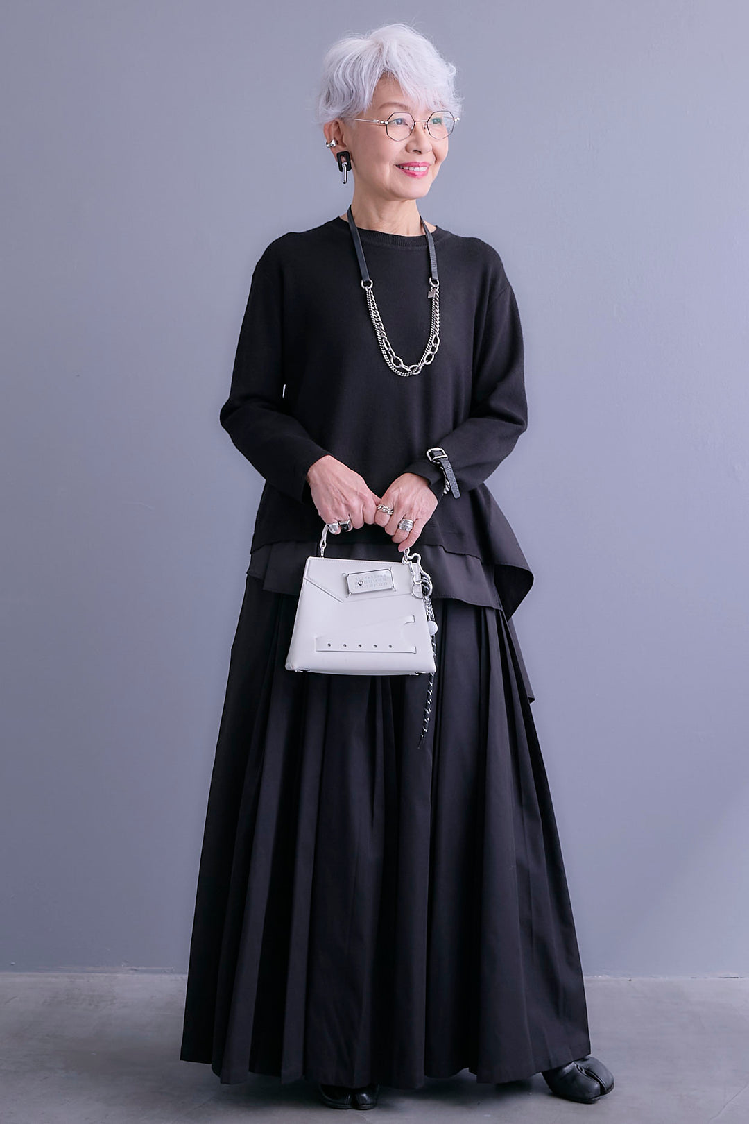 【SET】アシンメトリードレープレイヤードニット+シャークスキンWタックプリーツスカート(2set)